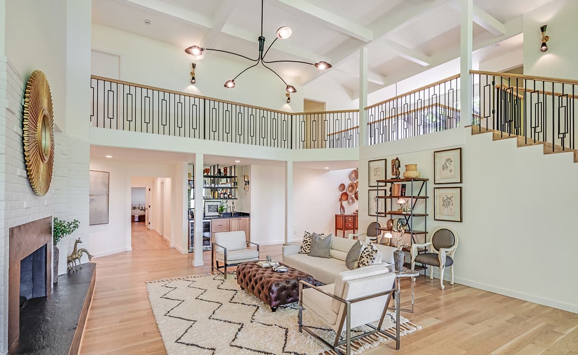 View of stair case from living room.